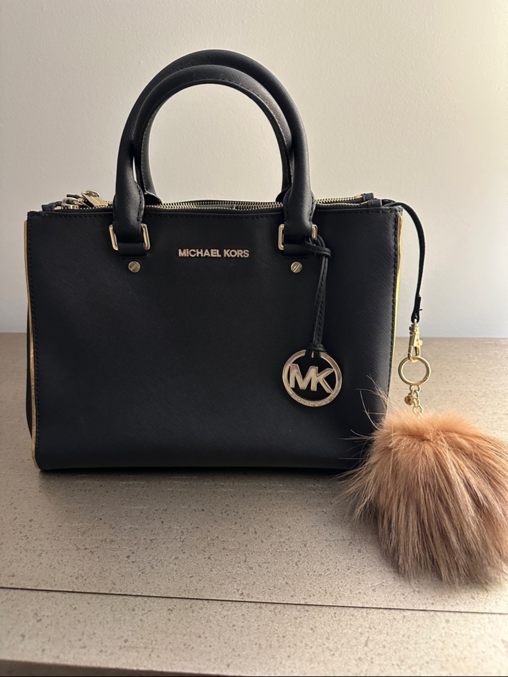 Michael Kors Black Saffiano Leather Satchel with Gold Hardware and Fur Pom